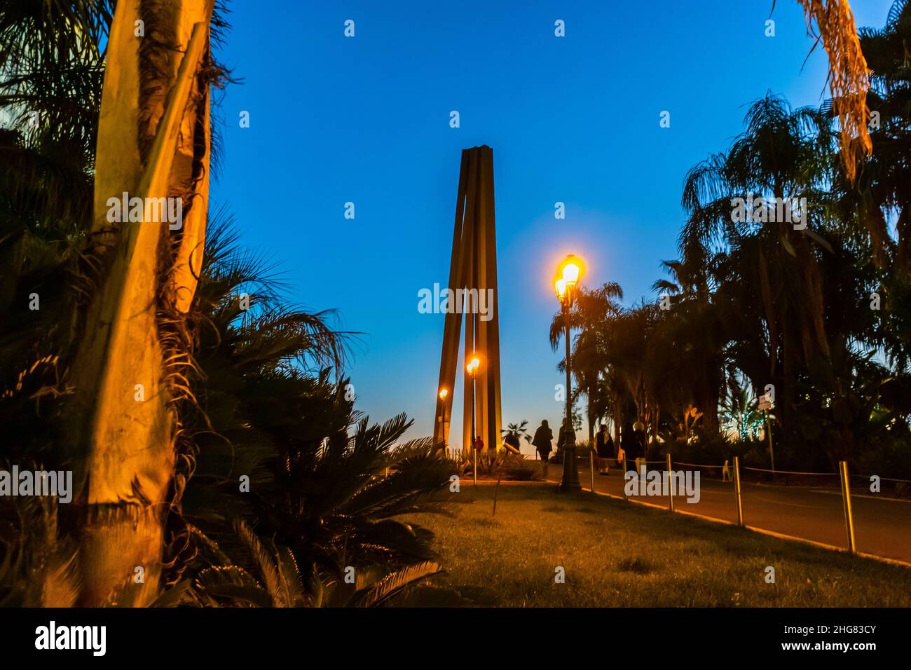 Nice, France, Modern Public Sculpture on Display. Outside at Night, Promenade des Anglais, credit: Bernar Venet | 'Le portail numerique des savoirs ...' Stock Photo