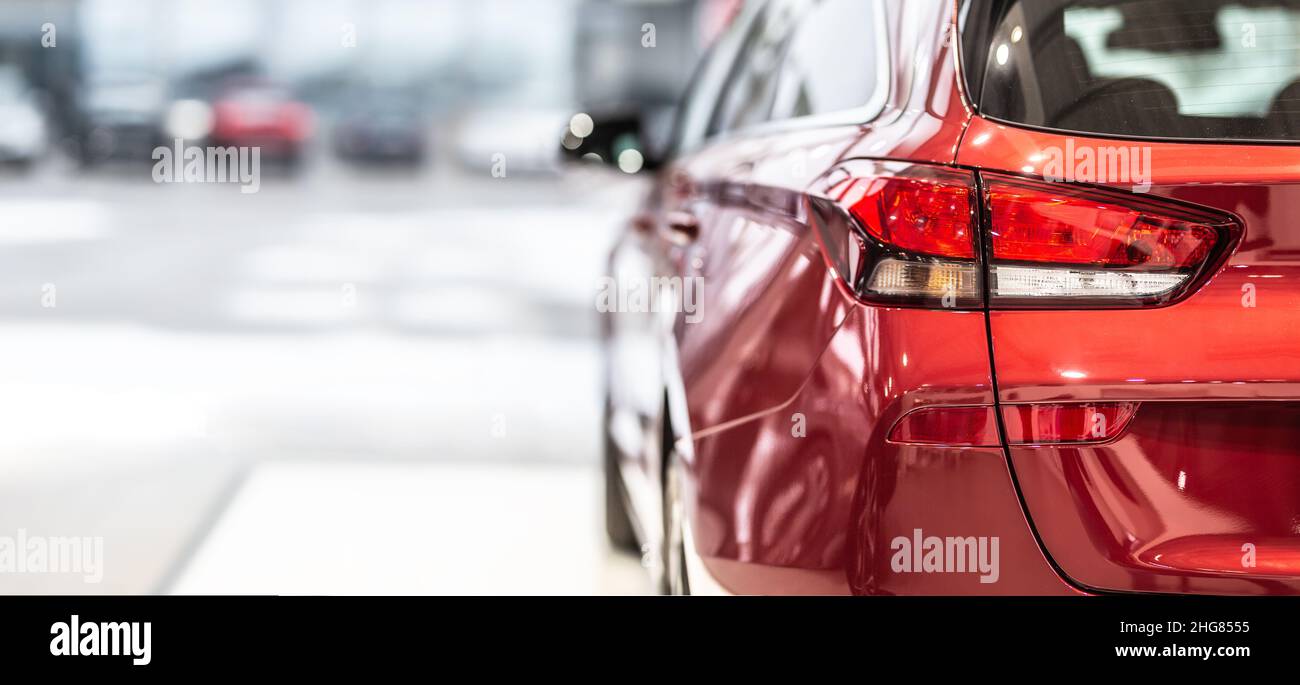 The rear of a new modern car in a car dealership Stock Photo - Alamy