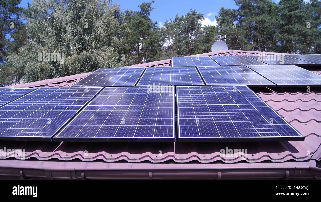 Roof of a House with Photovoltaic Solar Panels for renewable energy ...