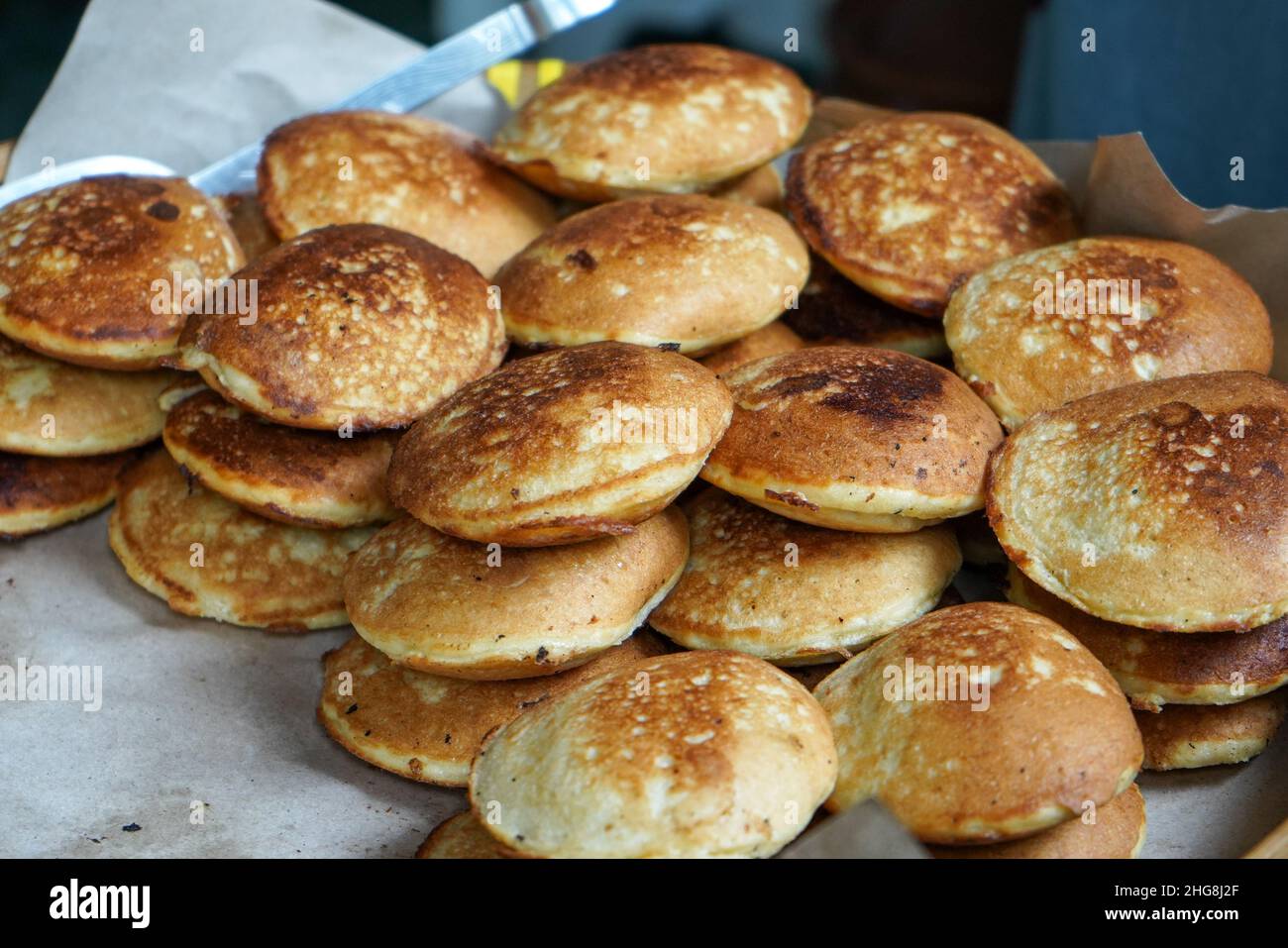 Appam is a type of pancake, originating from South India, made with fermented rice batter and coconut milk, common in Kerala Sri Lanka, Tamil Nadu. Stock Photo