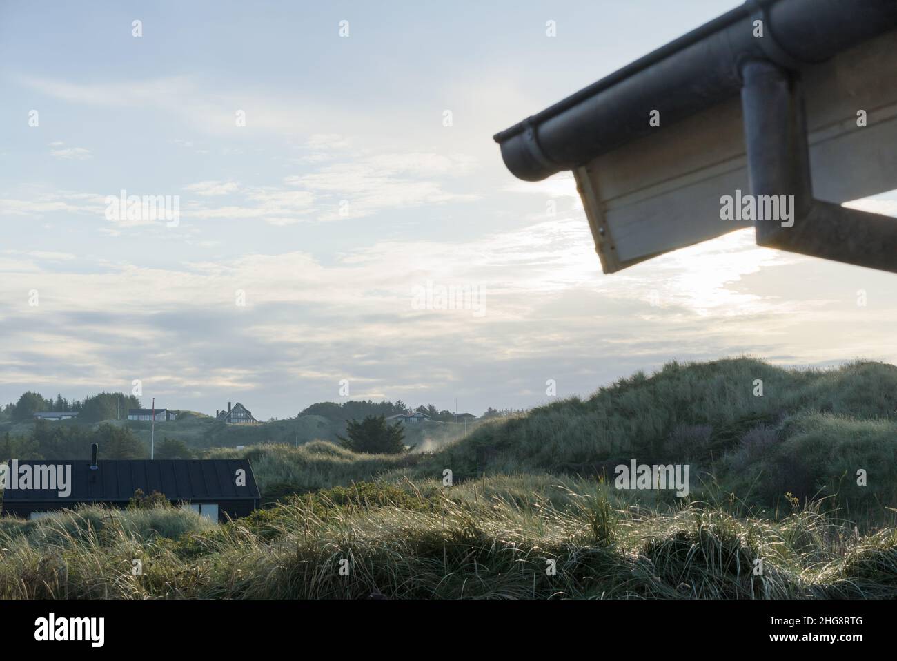 Holiday houses in the dunes in Denmark Stock Photo