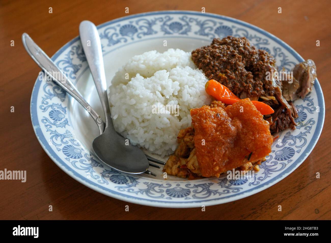 Gudeg is a traditional Javanese cuisine from Yogyakarta and Central Java, Indonesia. Gudeg is made from young unripe jack fruit (Javanese: gori, Indon Stock Photo
