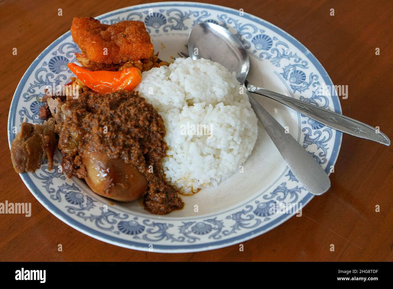 Gudeg is a traditional Javanese cuisine from Yogyakarta and Central Java, Indonesia. Gudeg is made from young unripe jack fruit (Javanese: gori, Indon Stock Photo