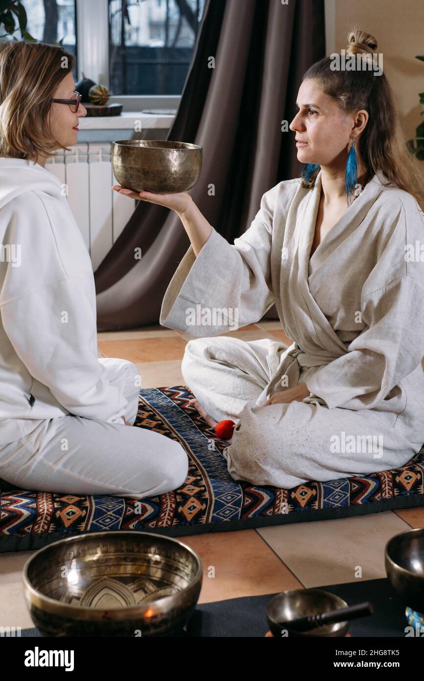 Sound healing with singing bowls, vibration massage and alternative