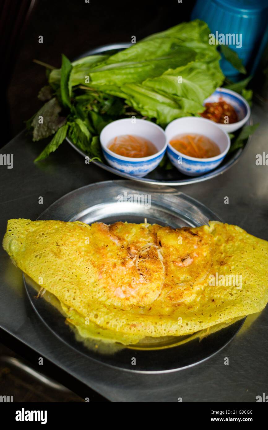 Delicious colorful local food banh xeo - crispy pancakes with shrimps ...