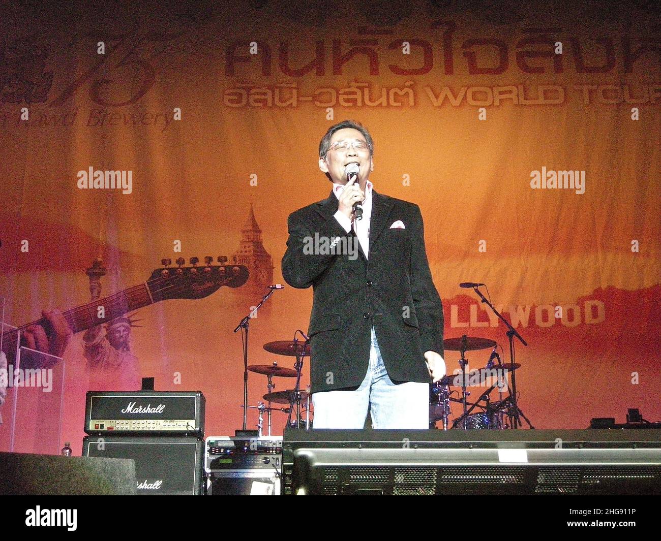 The concert got a record breaking sale as the biggest Thai concert in the UK , the audience came from all over the UK , the concert took place at the Hammersmith Town hall and had a audience of 2000 people . Chang Beer was the main sponsor along with ASCO Foods , Lebara,Millennium Hotel , Kappok ,Ora,Charm.The Heron ,Mango Tree ,Thai Rice ,Nuntee,Bangkok House , At Thai , Patara ,Thai Silk with helped to achieve the great result . It also market the 20 th Anniversary of Nuvo a World famous Thai Band . Stock Photo