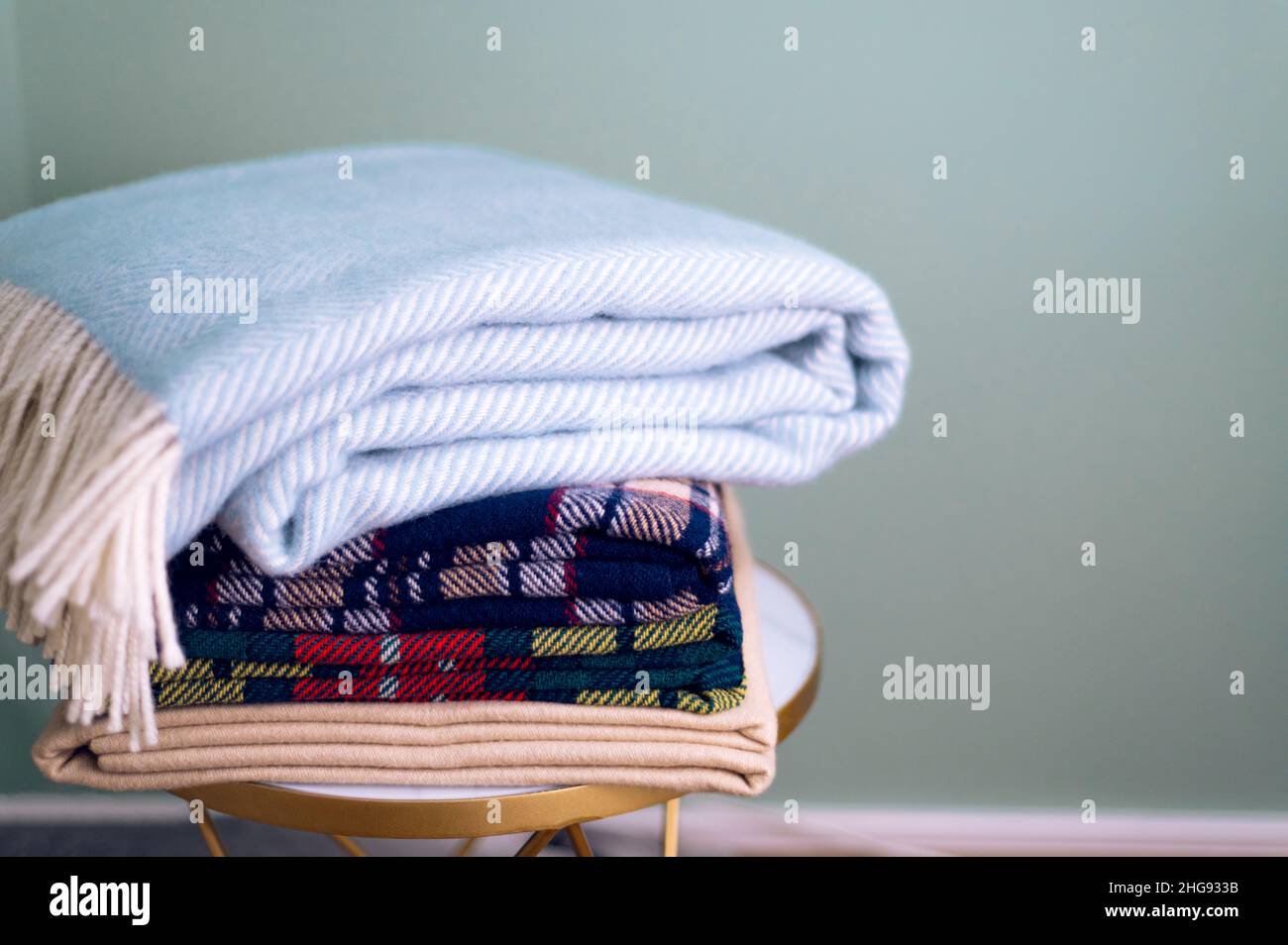 Stack of woolen checked blankets Stock Photo