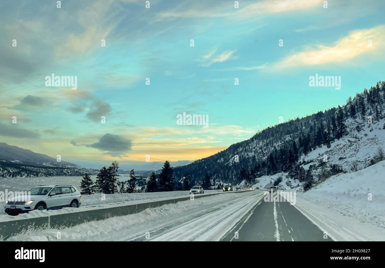 Winter road Between Vernon and Kelowna, British Columbia, Canada Stock Photo