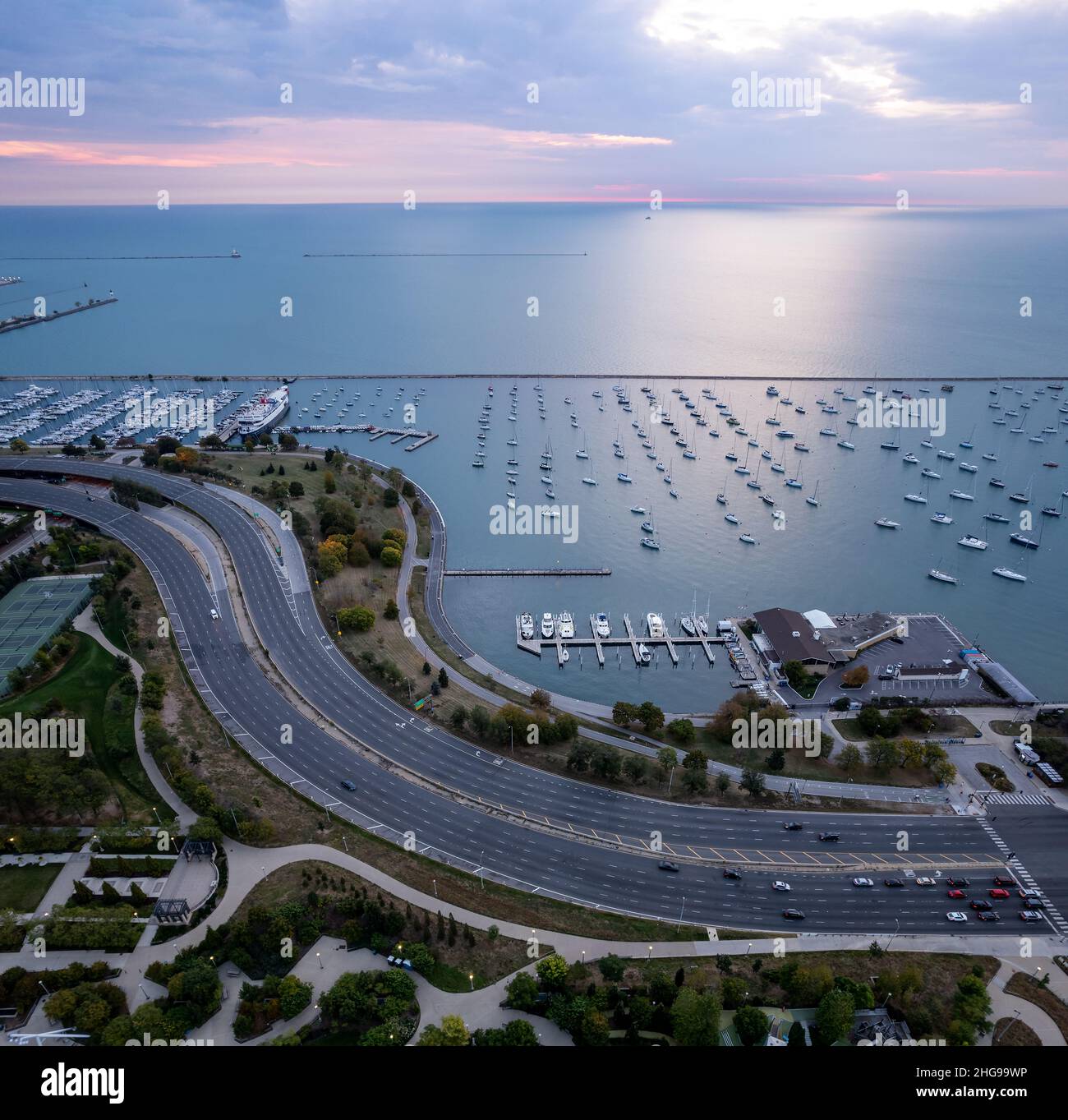 Aerial view of  DuSable Lakeshore Drive and Lake Michigan at sunrise, Chicago, Illinois, USA Stock Photo