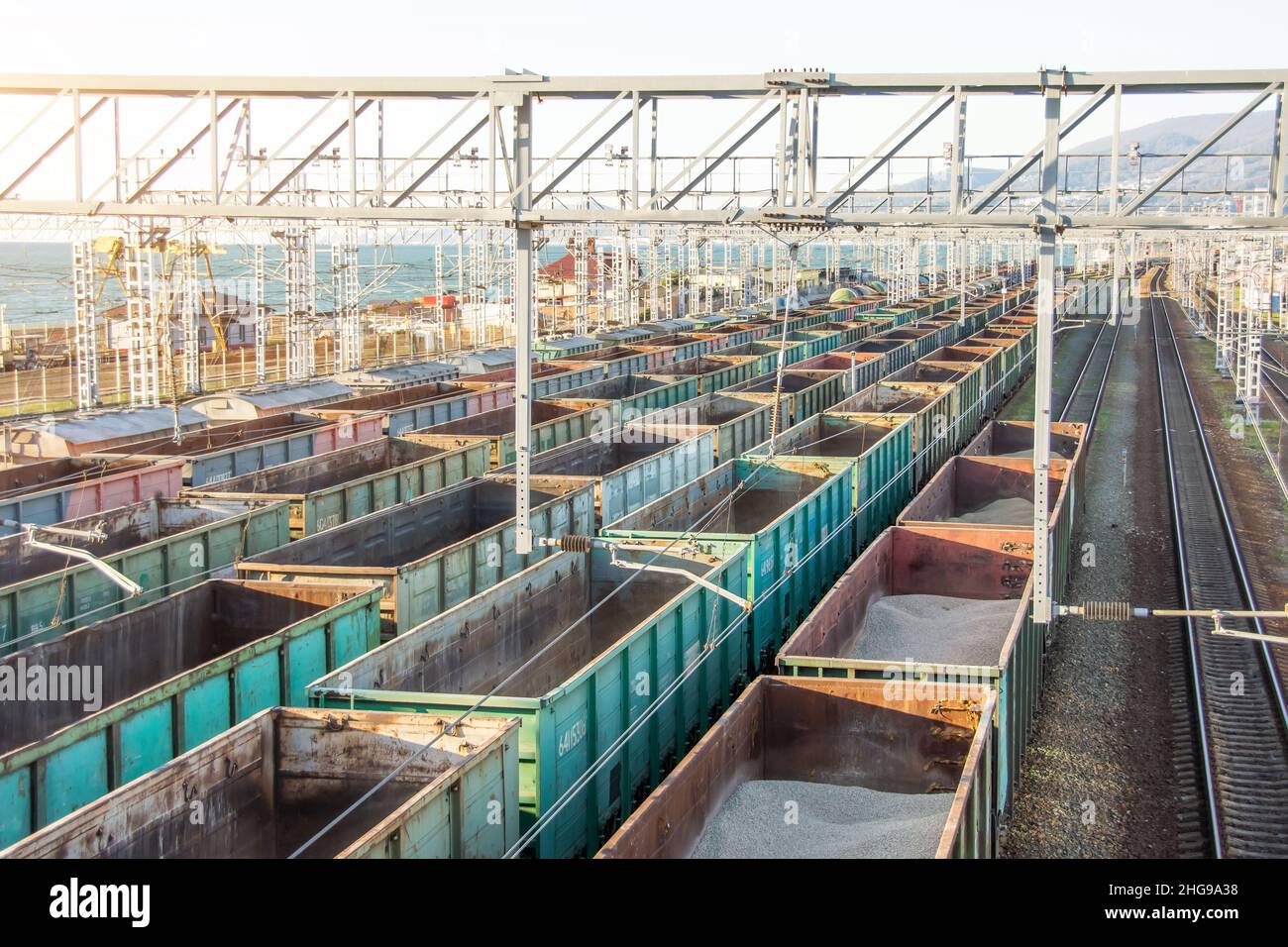 Freight Station with freight trains and various cargoes Stock Photo - Alamy