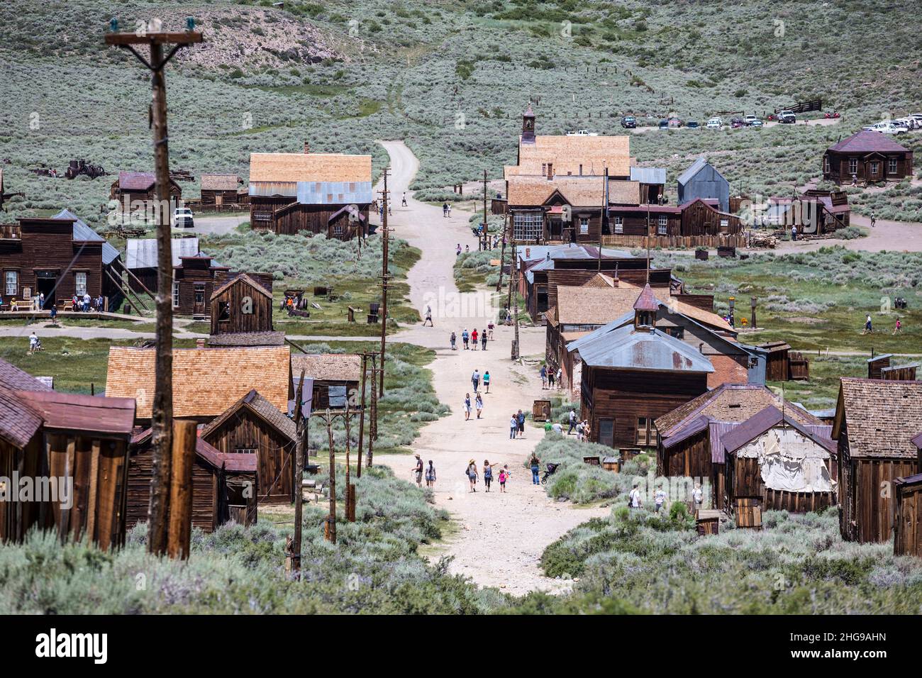 Bodie, California, USA - July 6, 2015:  Groups of summer tourists visiting Bodie ghost town in California's Bodie State Historic Park. Stock Photo