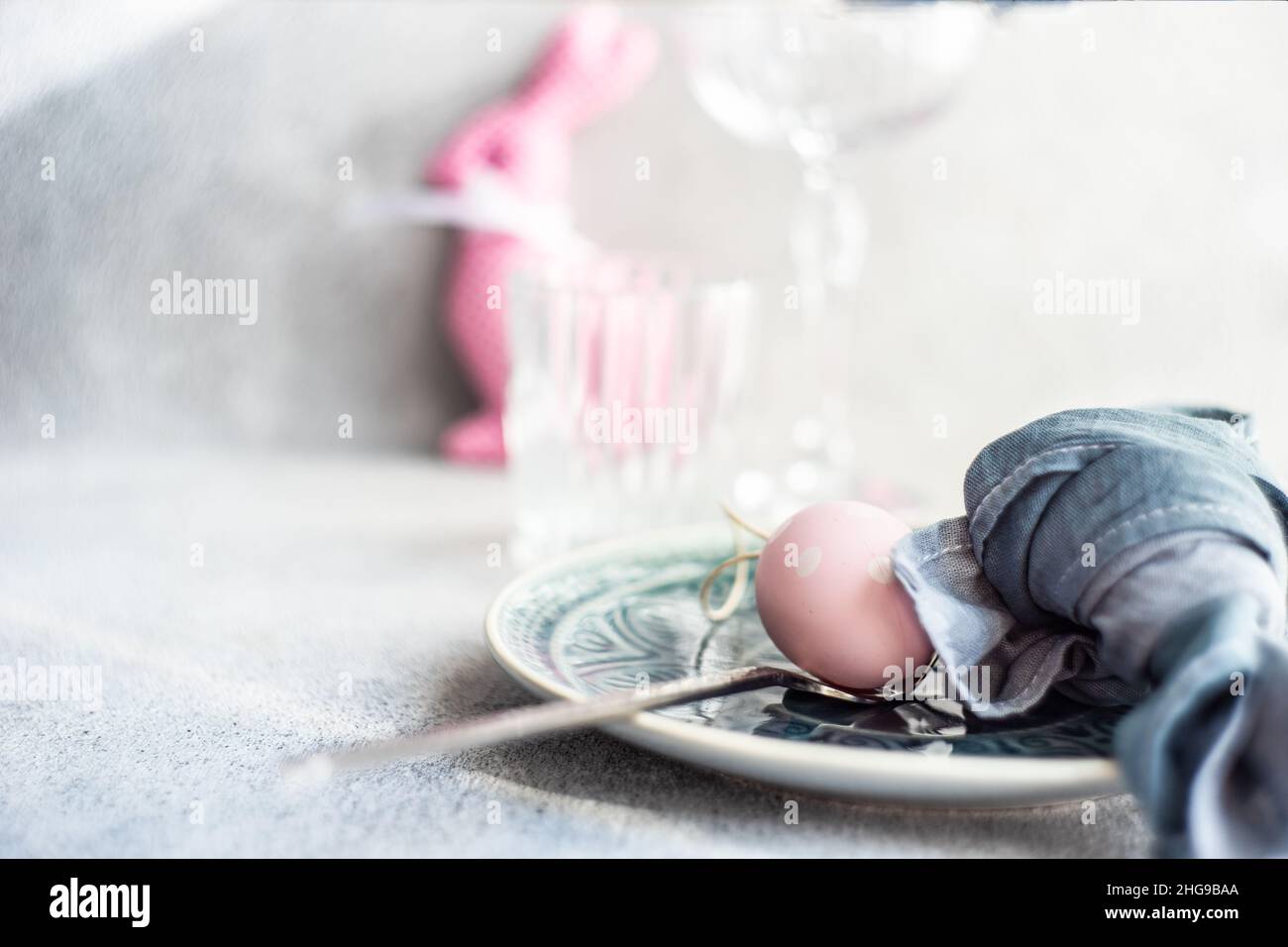 Festive Easter place setting with painted Easter eggs Stock Photo