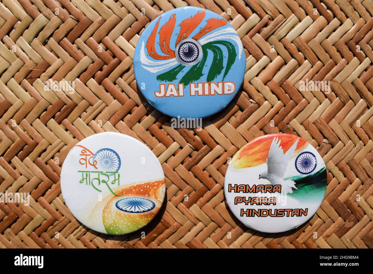 Indian Tricolour Badge pin written 'Jai hindi' meaning Hail India. and ' Our lovely India' and Vande mataram meaning ' Praise to our motherland' . Bla Stock Photo