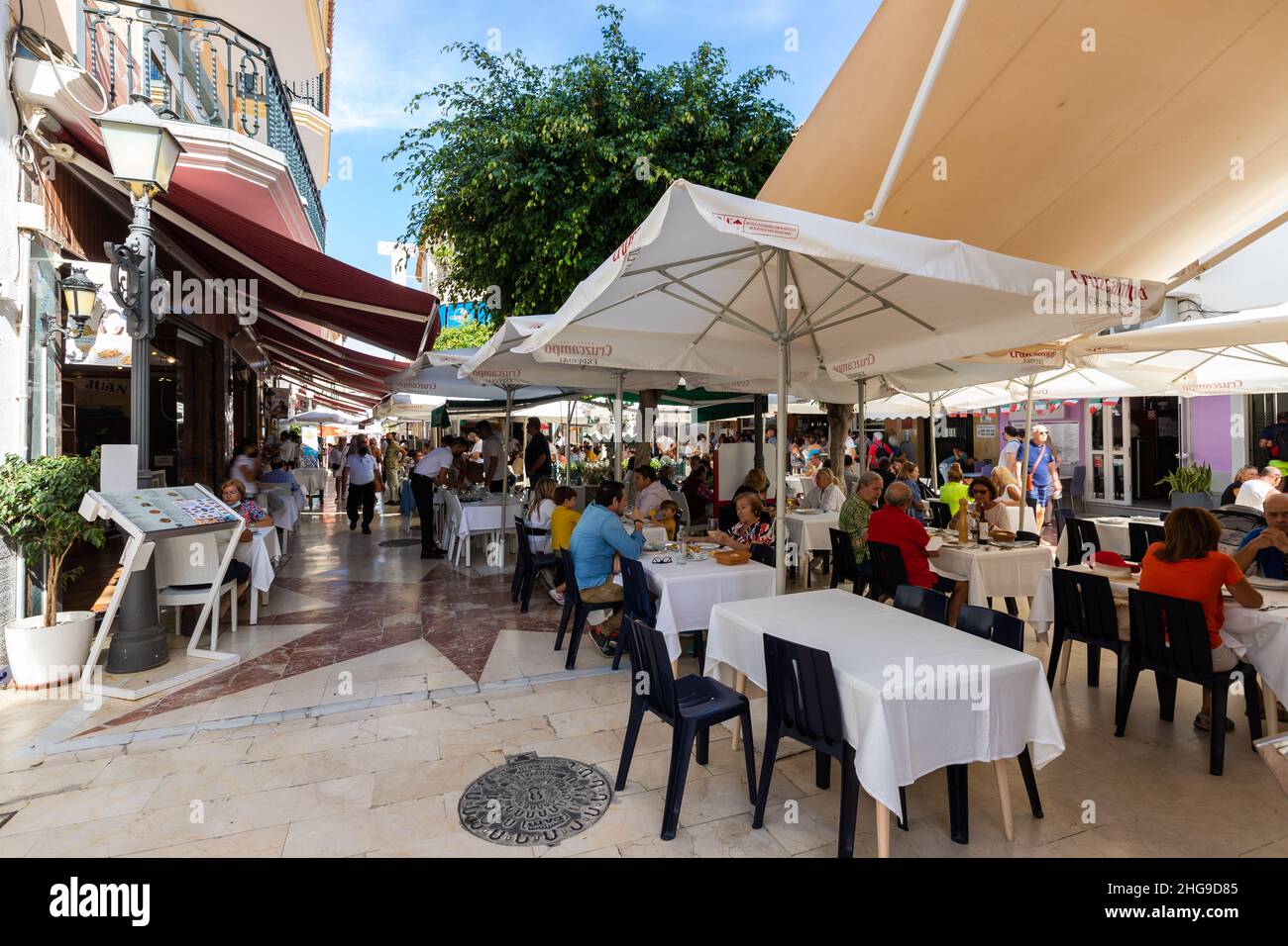 People having a meal at typical Andalucian restaurant in the Carihuela, Torremolinos, Spain Stock Photo