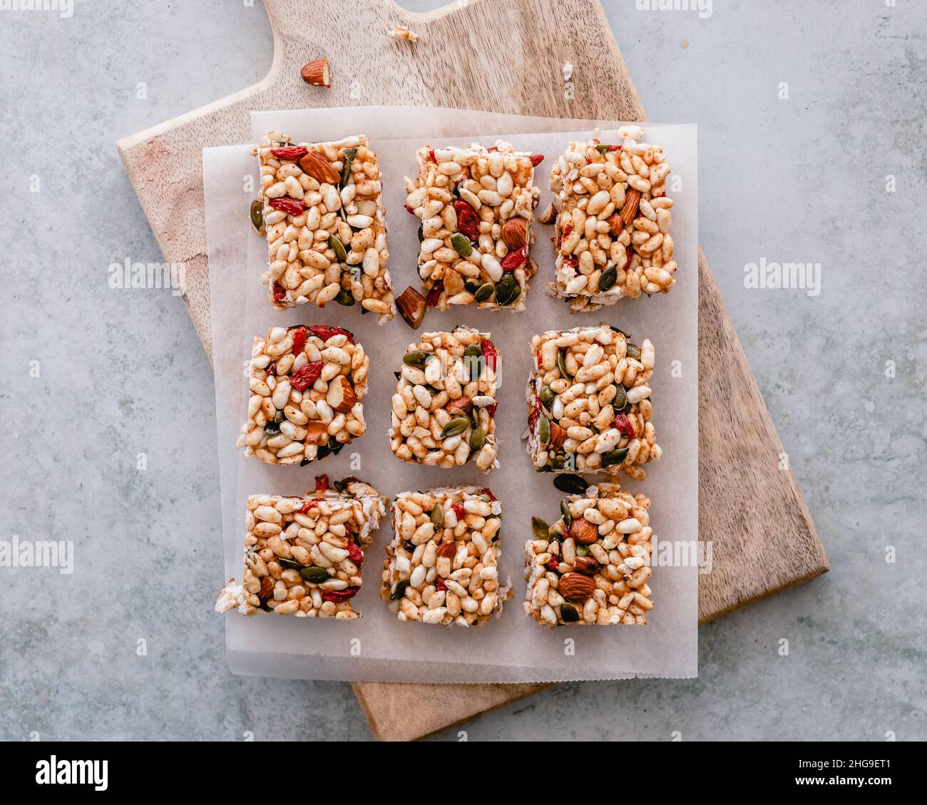 Puffed rice snack bars with goji berries, pumpkin seeds and almonds Stock Photo