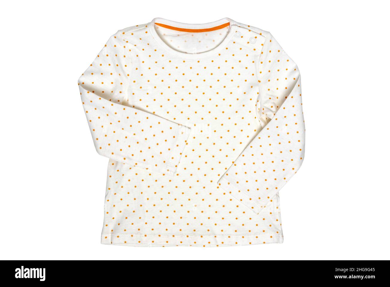 Summer shirt isolated. Closeup of a white baby girl shirt or t-shirt with yellow polka dots isolated on a white background. Clipping path. Children sp Stock Photo