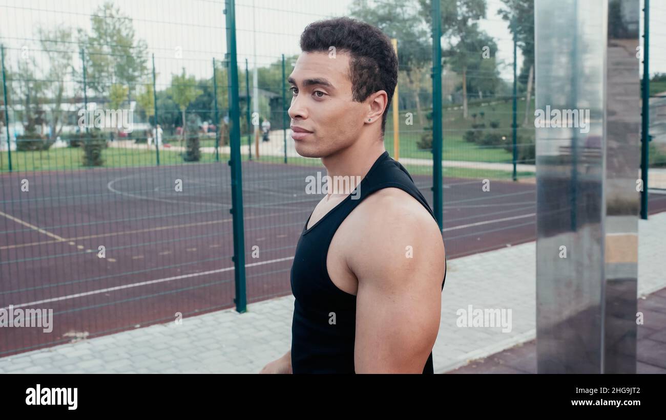 athletic mixed race man standing at outdoors gym,stock image Stock Photo