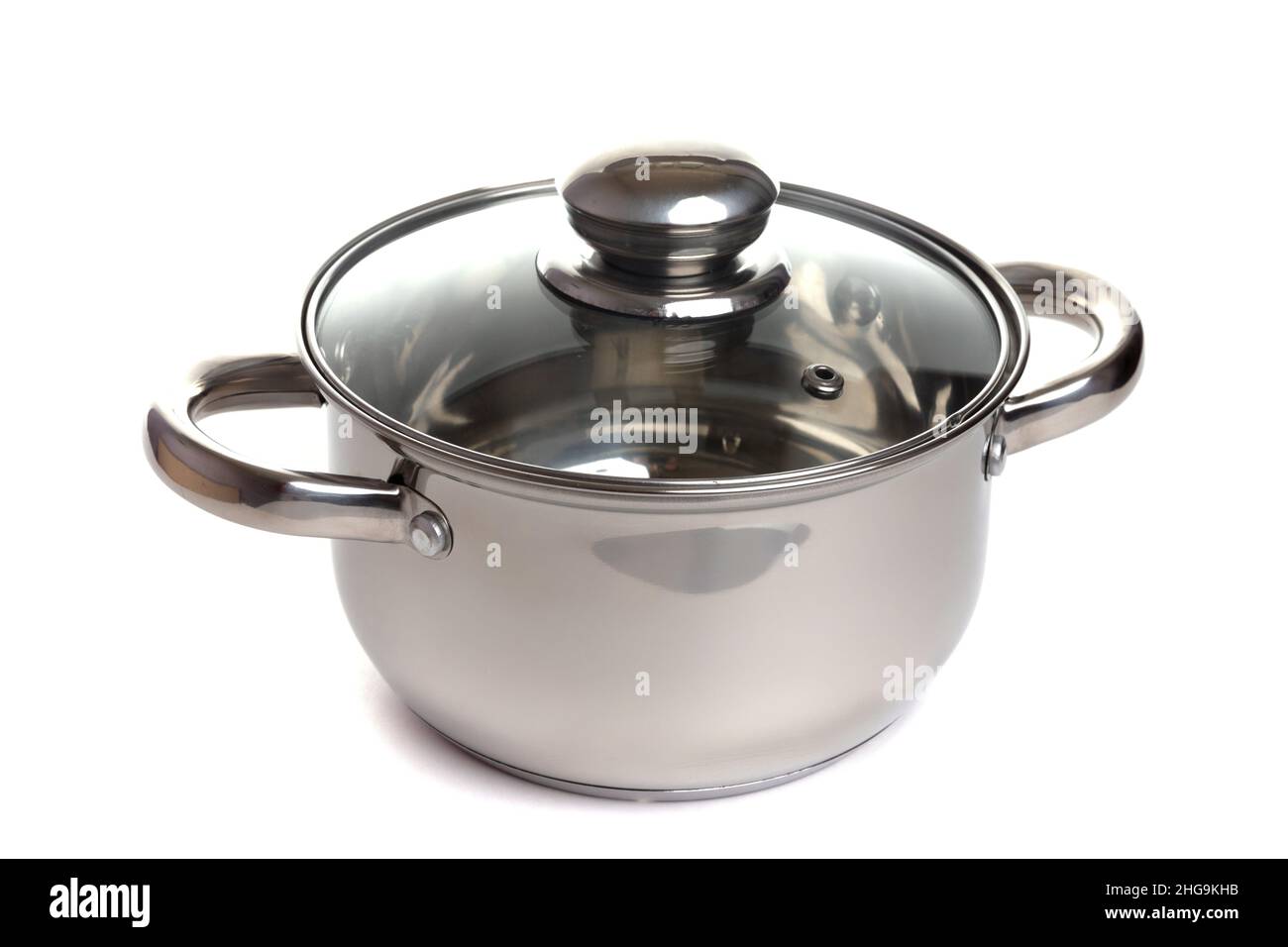 Shiny stainless steel soup pot, covered a lid transparent glass