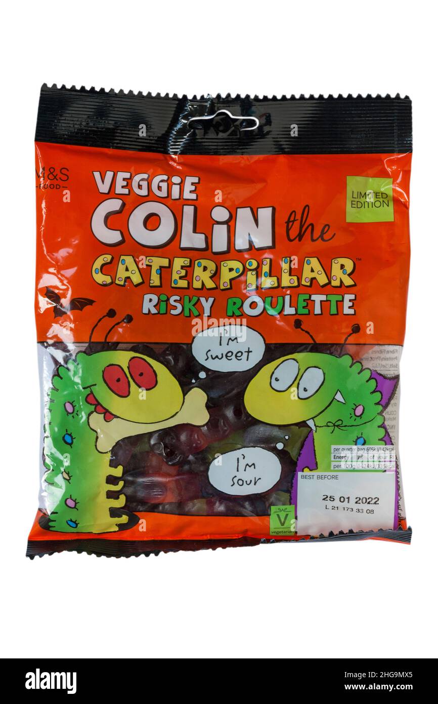 Packet of Limited Edition M&S Veggie Colin the Caterpillar sweets risky roulette set on white background - Colin the Caterpillar fruit flavour gums Stock Photo