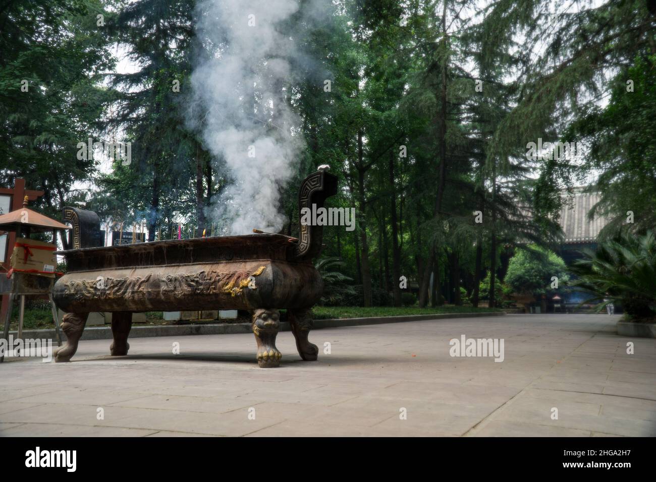 Gaint joss stick urn in QingYang Gong, Chengdu for devotee to place their joss stick after prayer Stock Photo