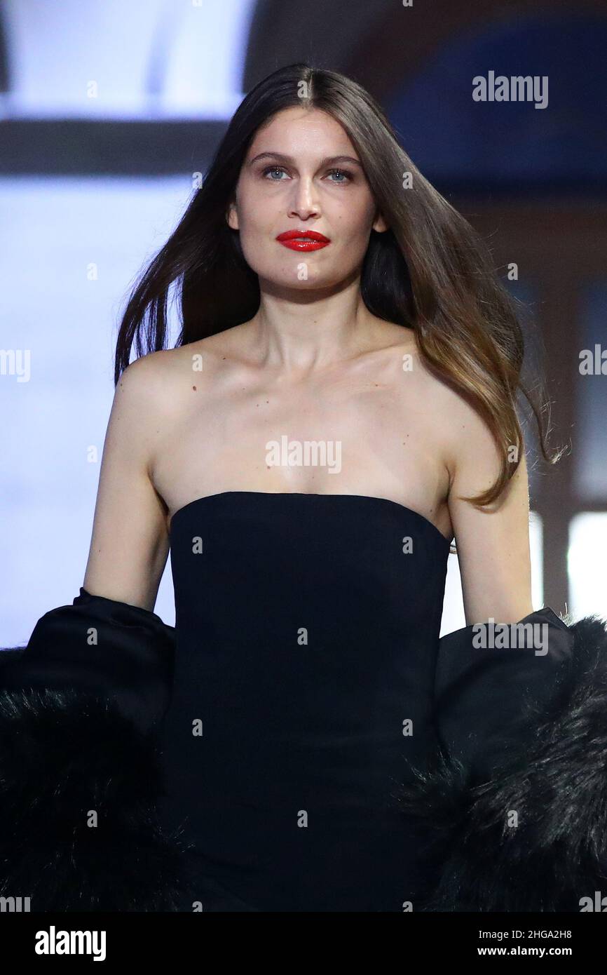 Model and actress Laetitia Casta presents a creation by designer