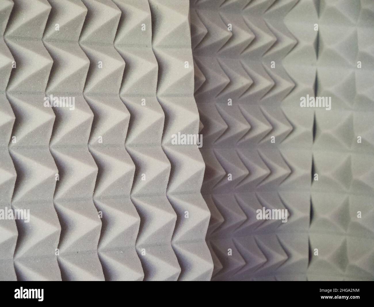 Plates of gray soundproof foam rubber. Sound-absorbing material. Stock Photo