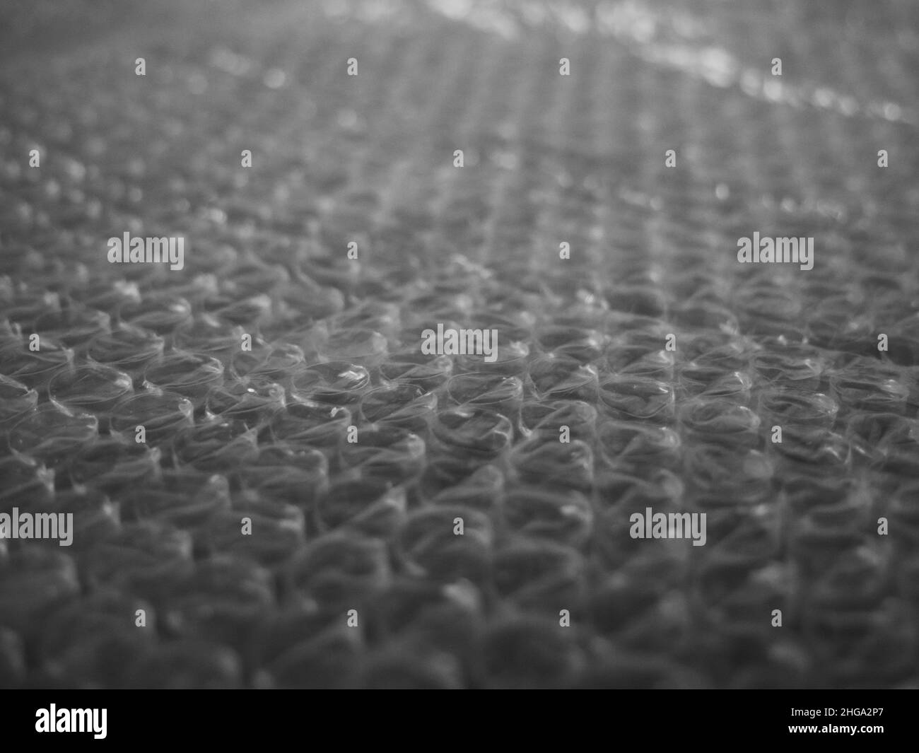 Bubble wrap is a pliable transparent plastic material used for packing