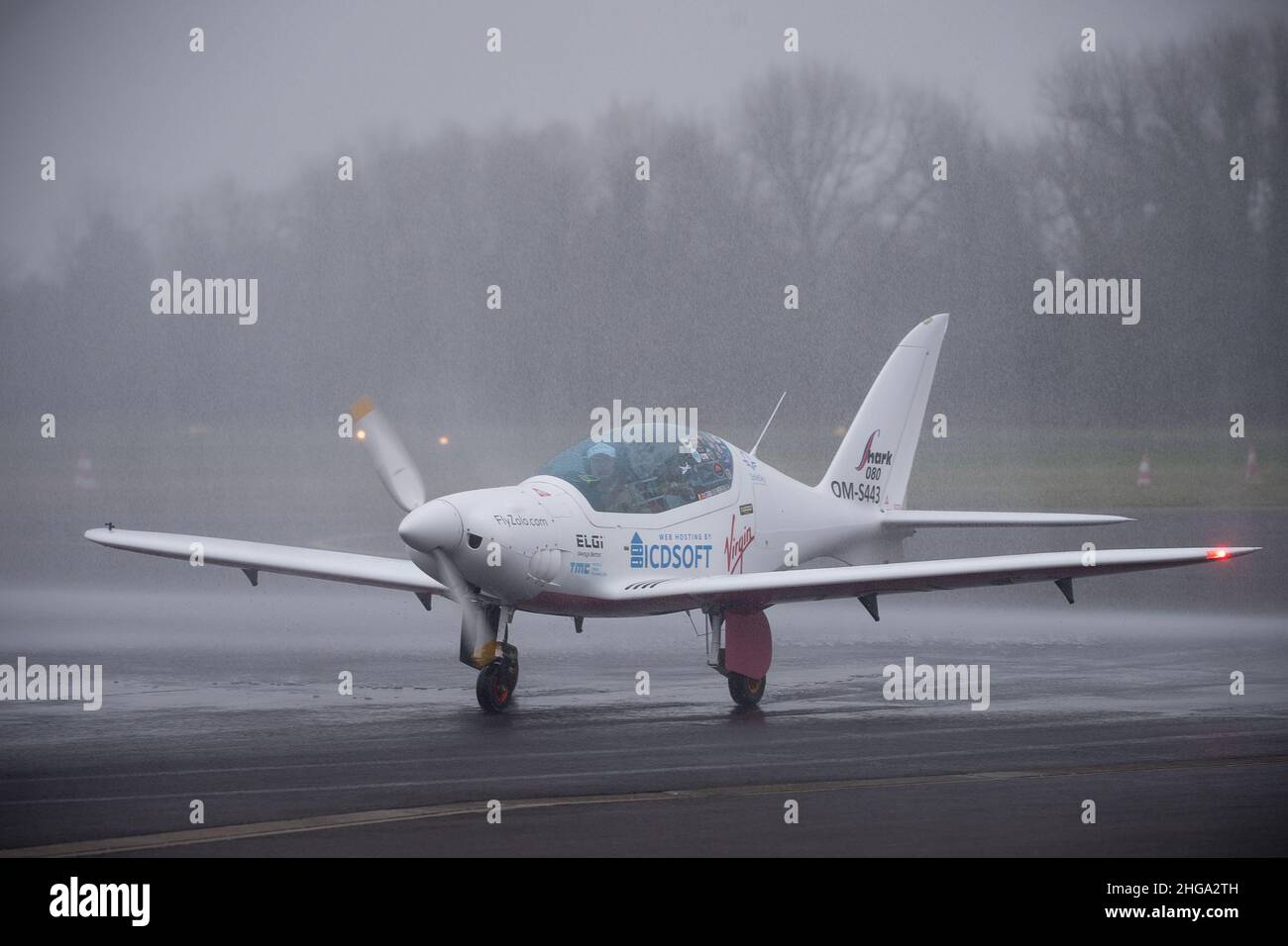 19 January 2022, Hessen, Egelsbach: Pilot Zara Rutherford Drives Her Shark  Aero Aircraft Through A Water Fountain After Landing At Frankfurt-Egelsbach  Airfield. The 19-Year-Old Had Taken Off From Belgium In August 2021
