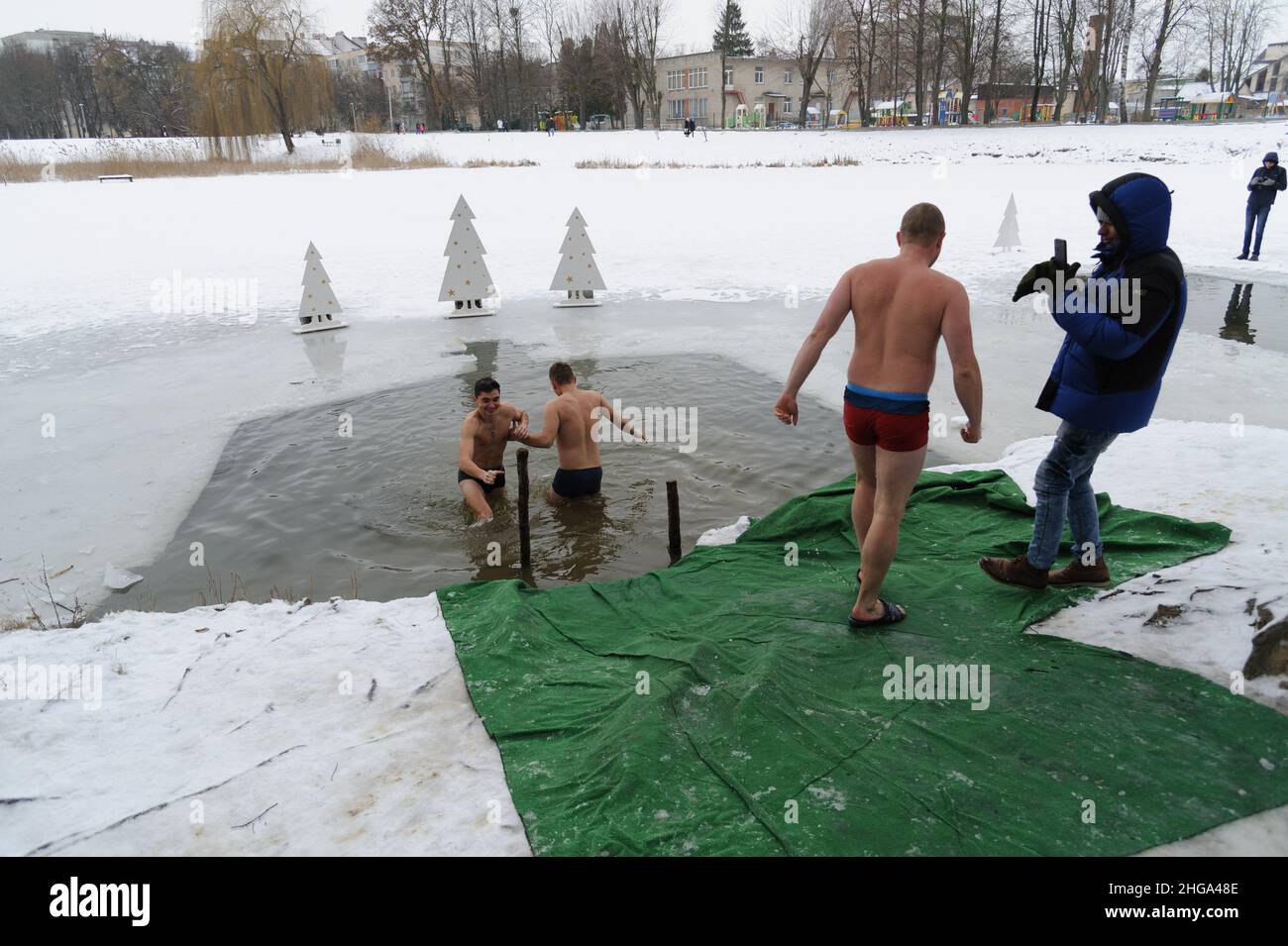 Lviv, Ukraine 19 Jan 2022, People of orthodox religion bath in cold