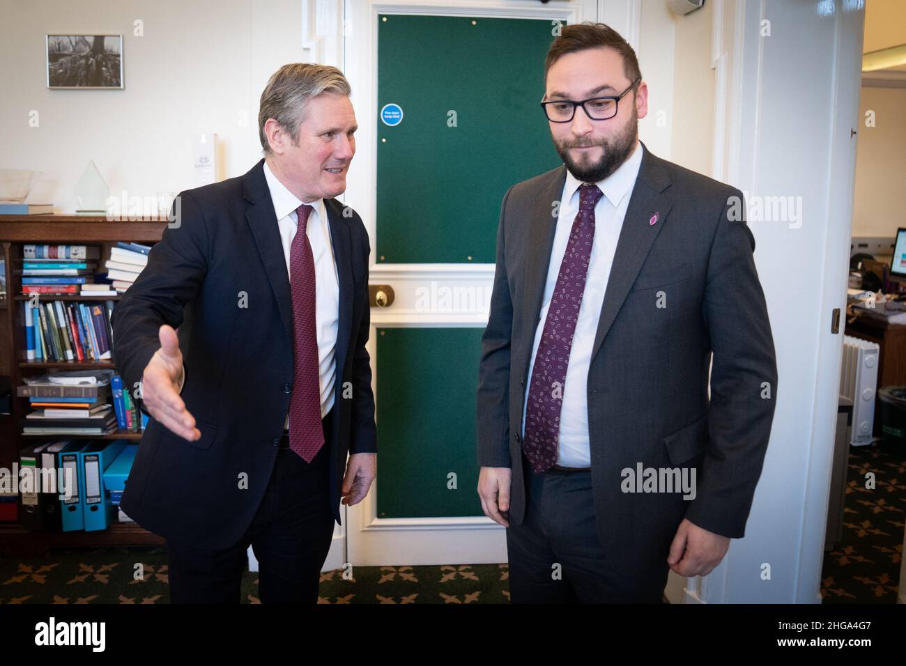 Labour leader Sir Keir Starmer with Bury South MP Christian Wakeford, who has defected from the Conservatives to Labour, in his office in the Houses of Parliament, Westminster. Picture date: Wednesday January 19, 2022. Stock Photo