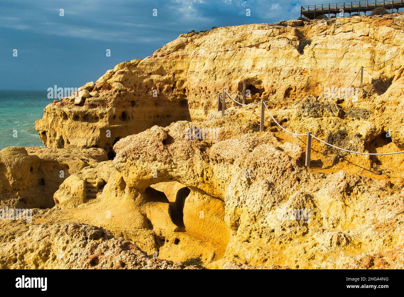 Part of the Algar Seco Cliff Walk, over the eroded limestone cliffs close to Carvoeiro, Algarve, Portugal Stock Photo