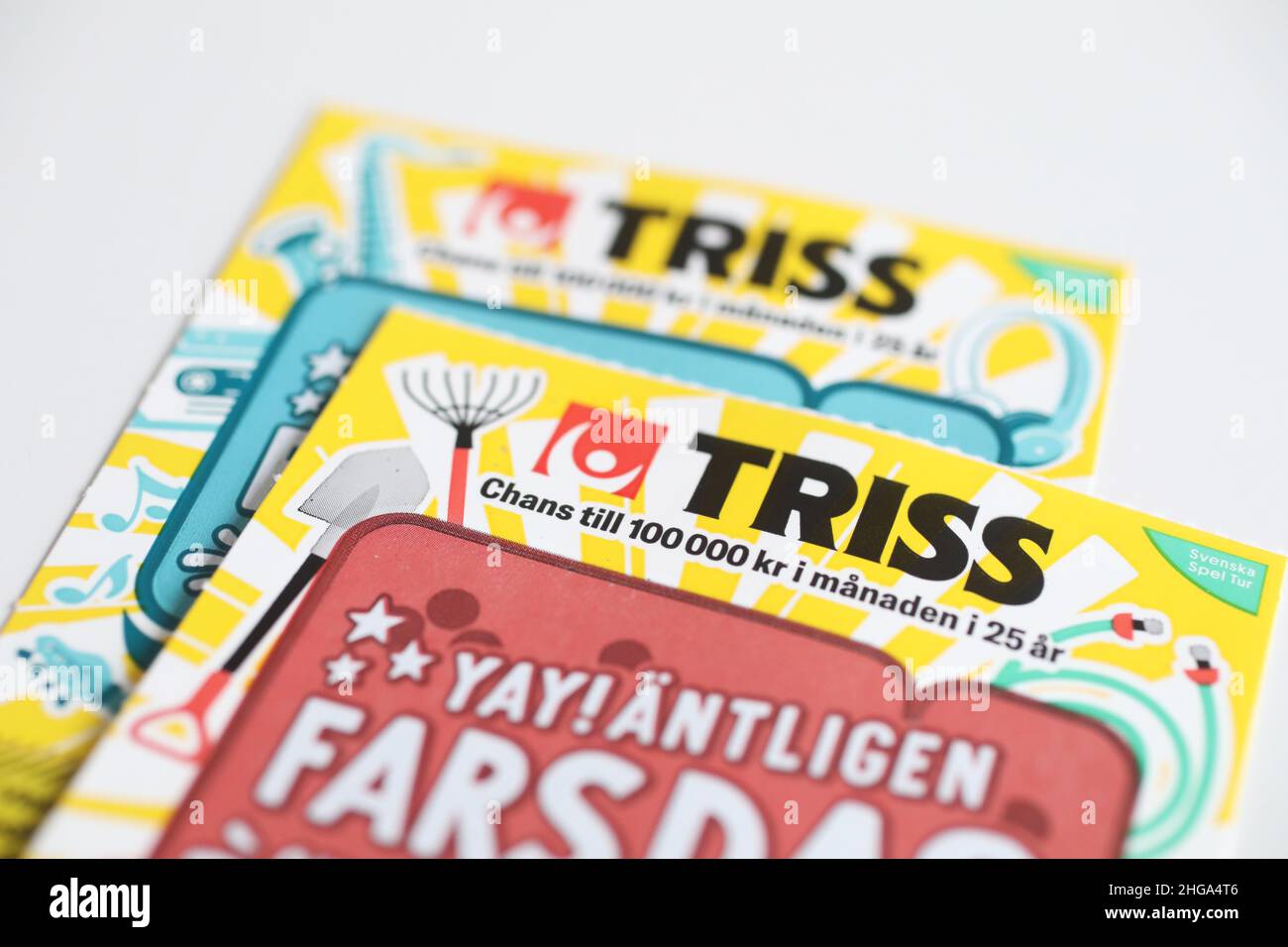 Gift for Father's Day. Father's day (In swedish: Fars dag), is celebrated on the second Sunday of November but is not a public holiday. in the picture: A lottery scratch game ticket (triss) from Svenska Spel company. Stock Photo