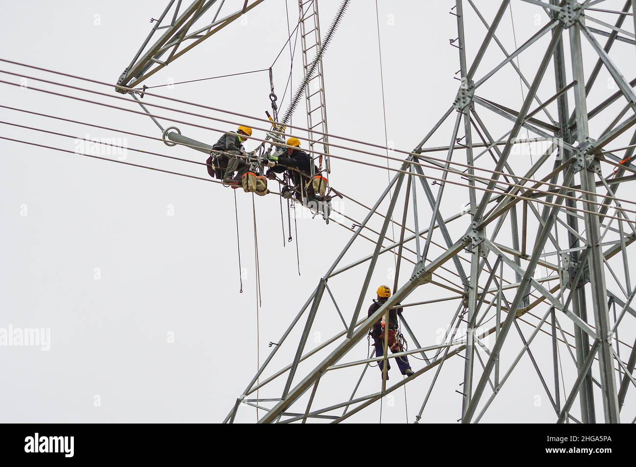 Installation and assembly of highrise electrical towers Stock Photo Alamy