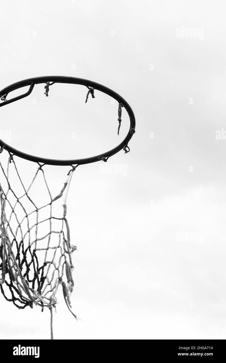 Black and white image of basketball net torn from hoop Stock Photo - Alamy