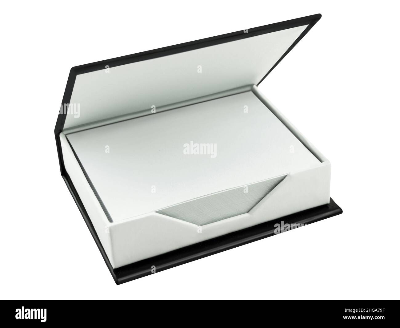 Notepads in a black box isolated against white background Stock Photo