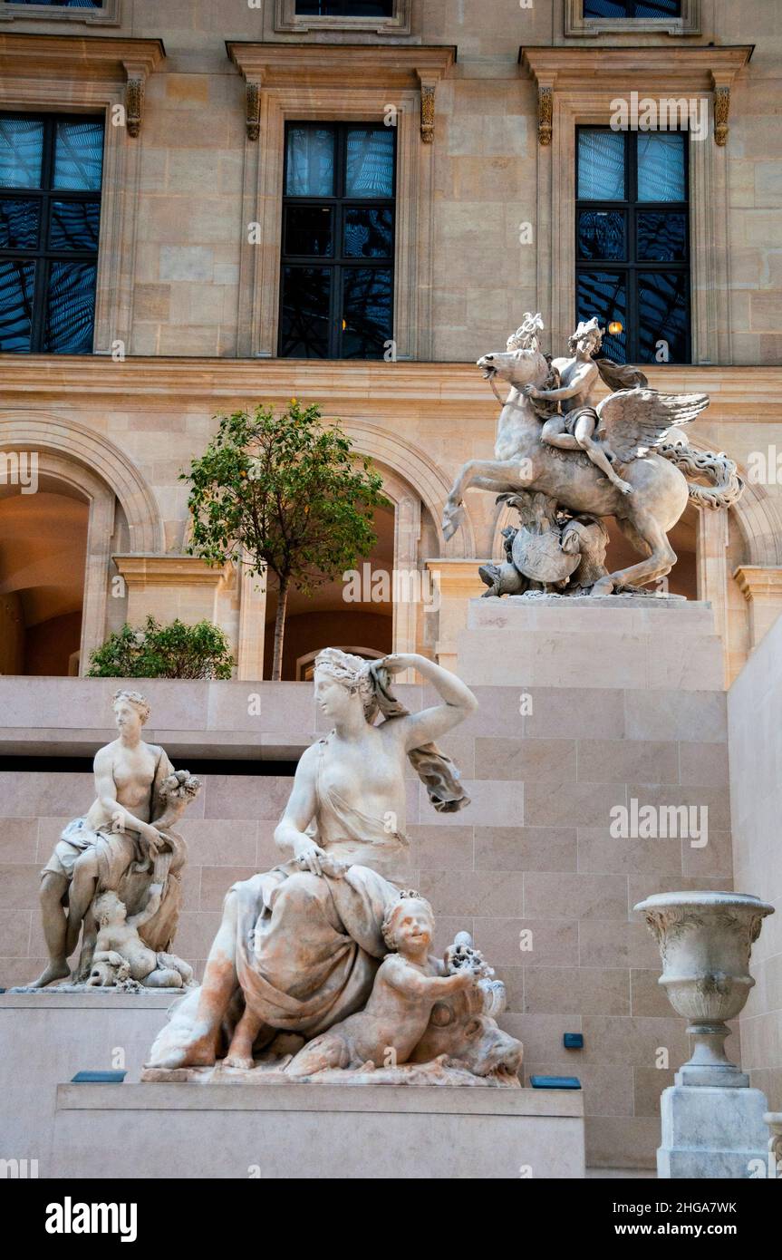 Mercury, one of the Marly Horses at the Richelieu Wing of the Louvre Museum  in Paris housing magnificent French sculptures in a open courtyard Stock  Photo - Alamy