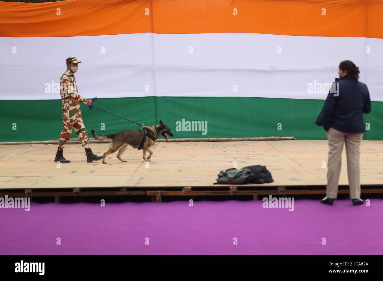 New Delhi, New Delhi, India. 19th Jan, 2022. An Indian soldier walks with a military dog as they inspect the venue of India's Republic Day celebrations. (Credit Image: © Karma Sonam Bhutia/ZUMA Press Wire) Stock Photo