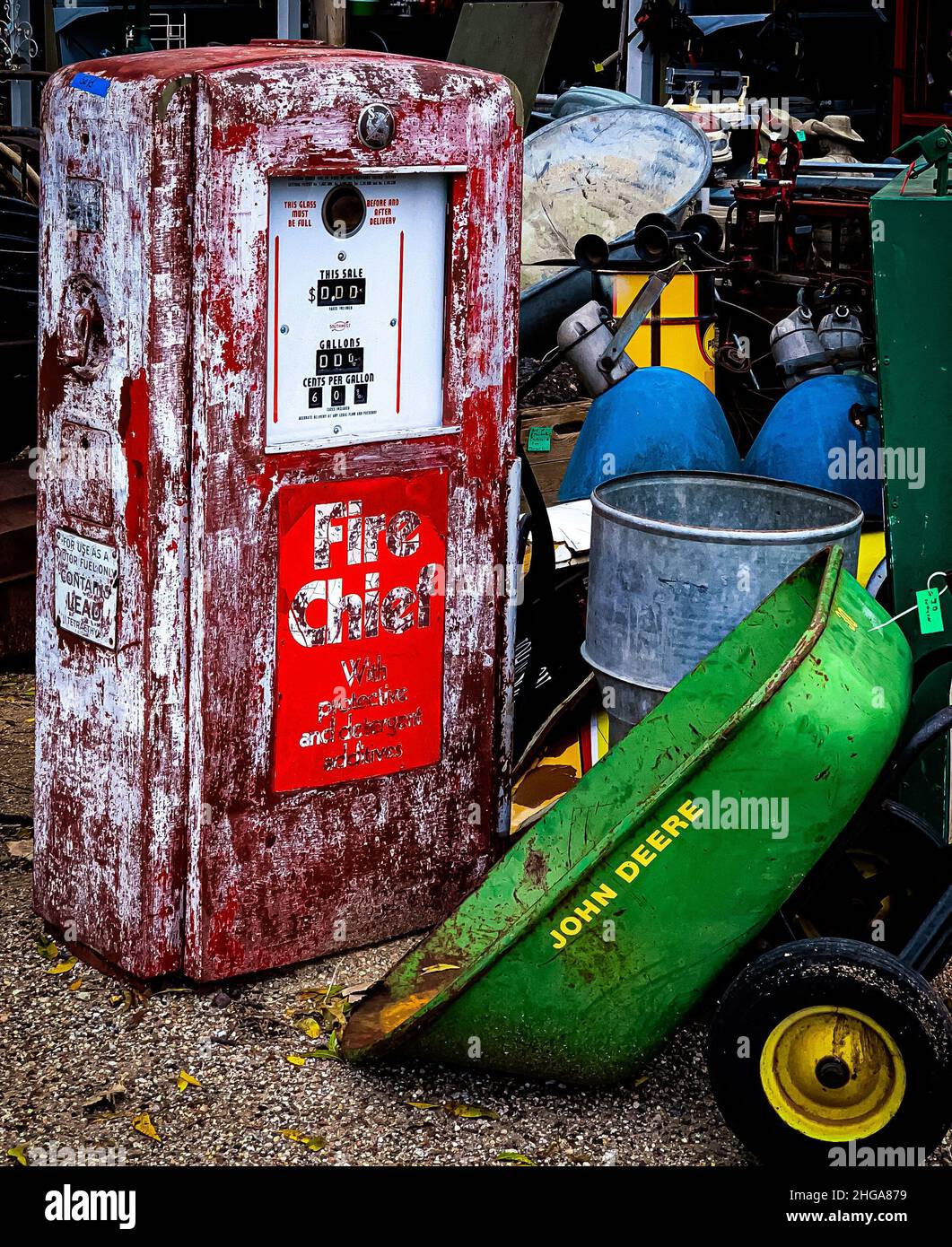 Texas Junk Store with Old Petrol/Gas Pump and Wheelbarrow Stock Photo Alamy