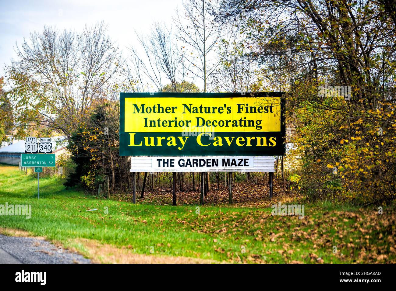 Shenandoah , USA - October 27, 2020: Luray caverns road sign advertisement in Virginia for cave stalagmites rock formations and the garden maze in aut Stock Photo