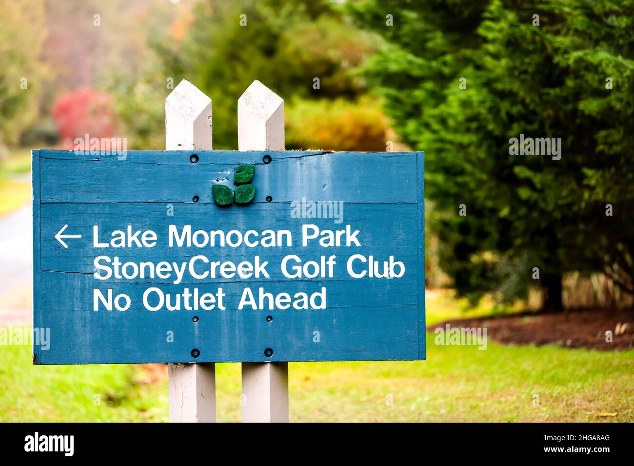 Wintergreen, USA - October 25, 2020: Ski resort town village in Blue Ridge mountains with sign entrance for Lake Monocan Park and Stoney Creek Golf Cl Stock Photo