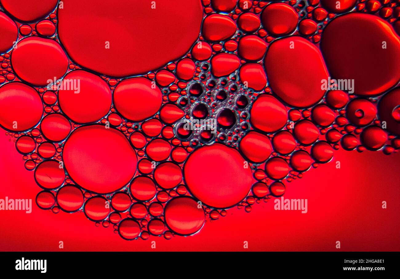 Oil on Water Abstract in Red Stock Photo