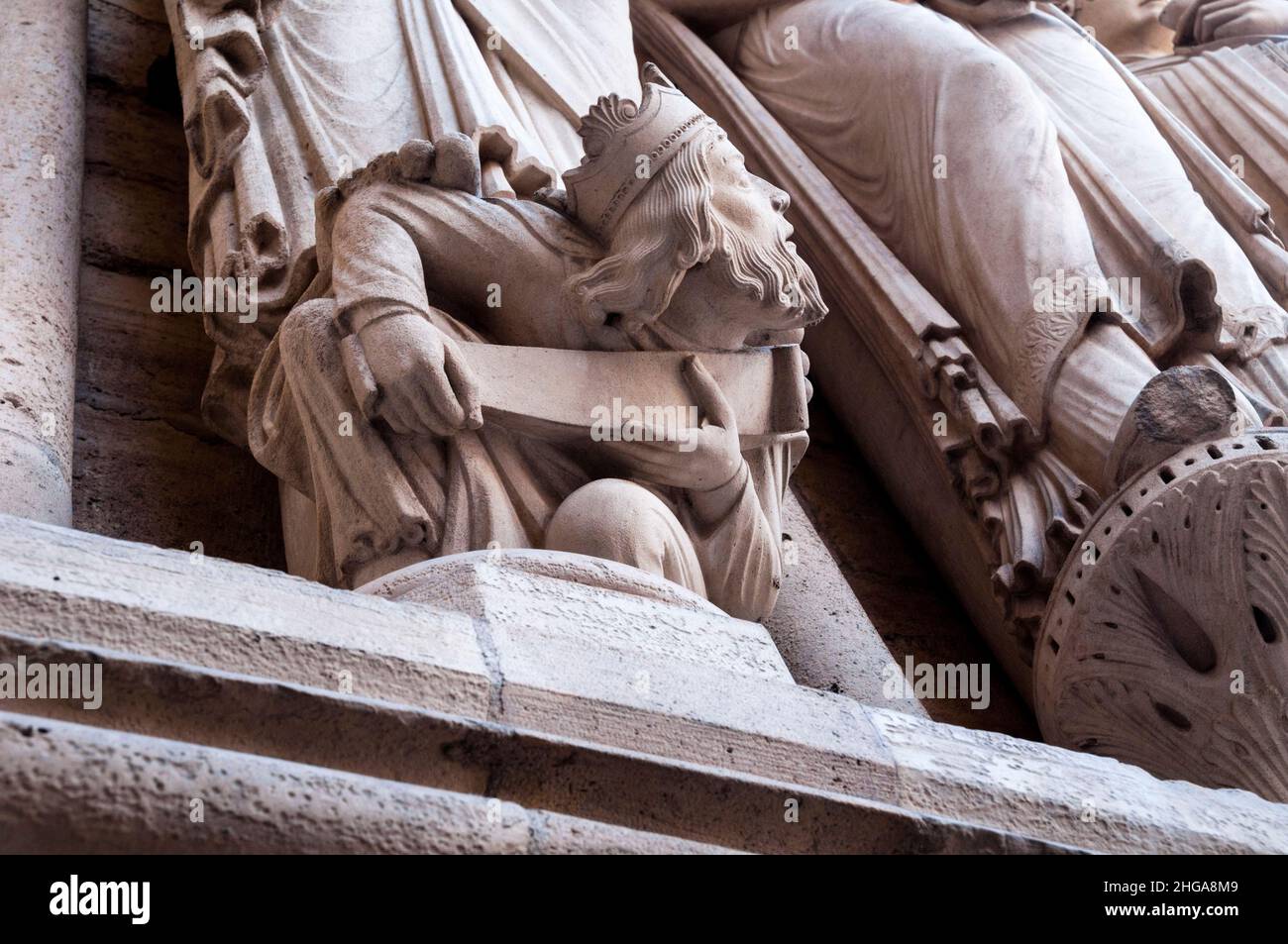 Medieval stone sculpture on the facade of Notre Dame Cathedral in Paris, France. Stock Photo