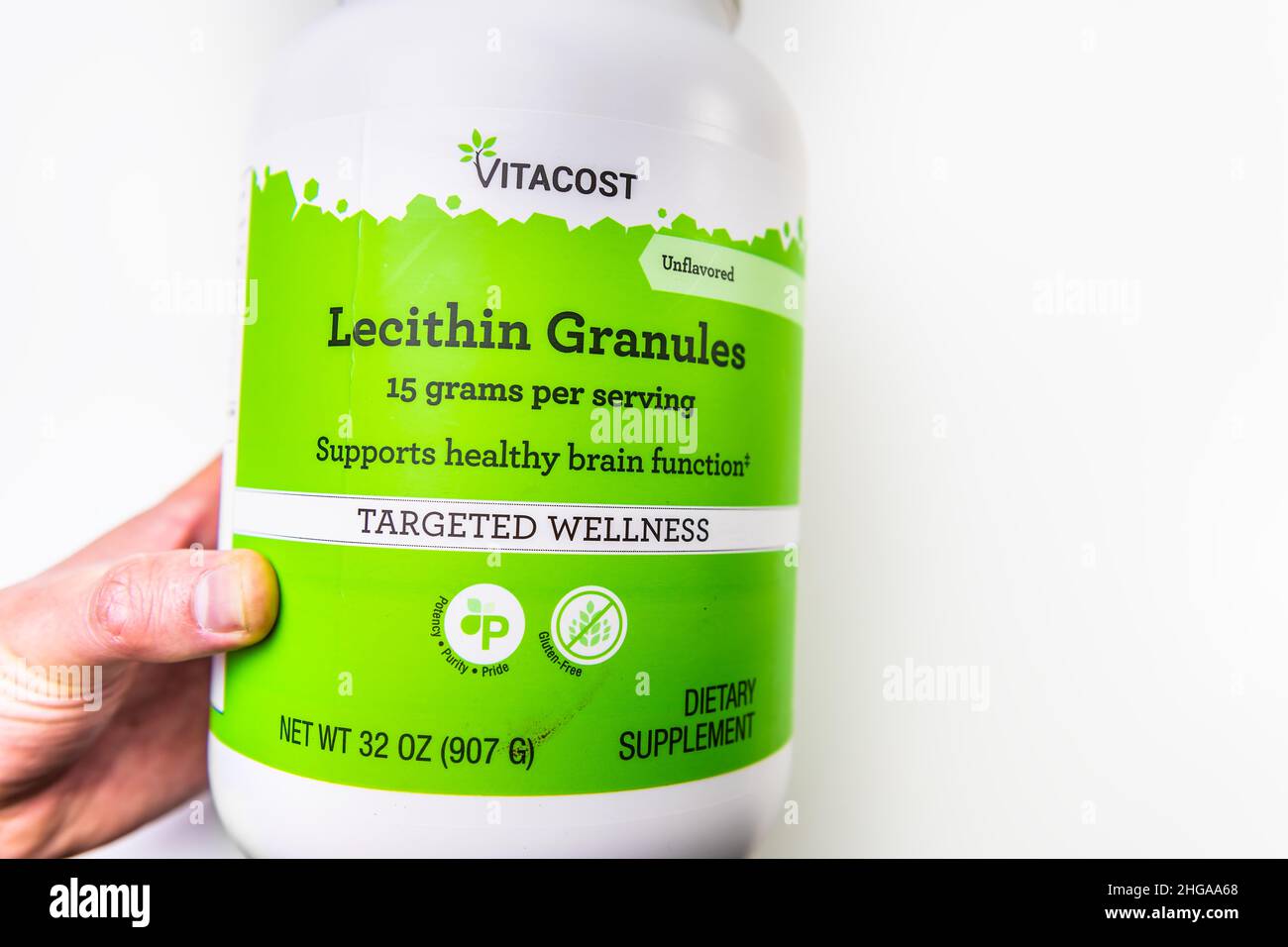 Naples, USA October 21, 2021 Closeup macro hand holding supplement