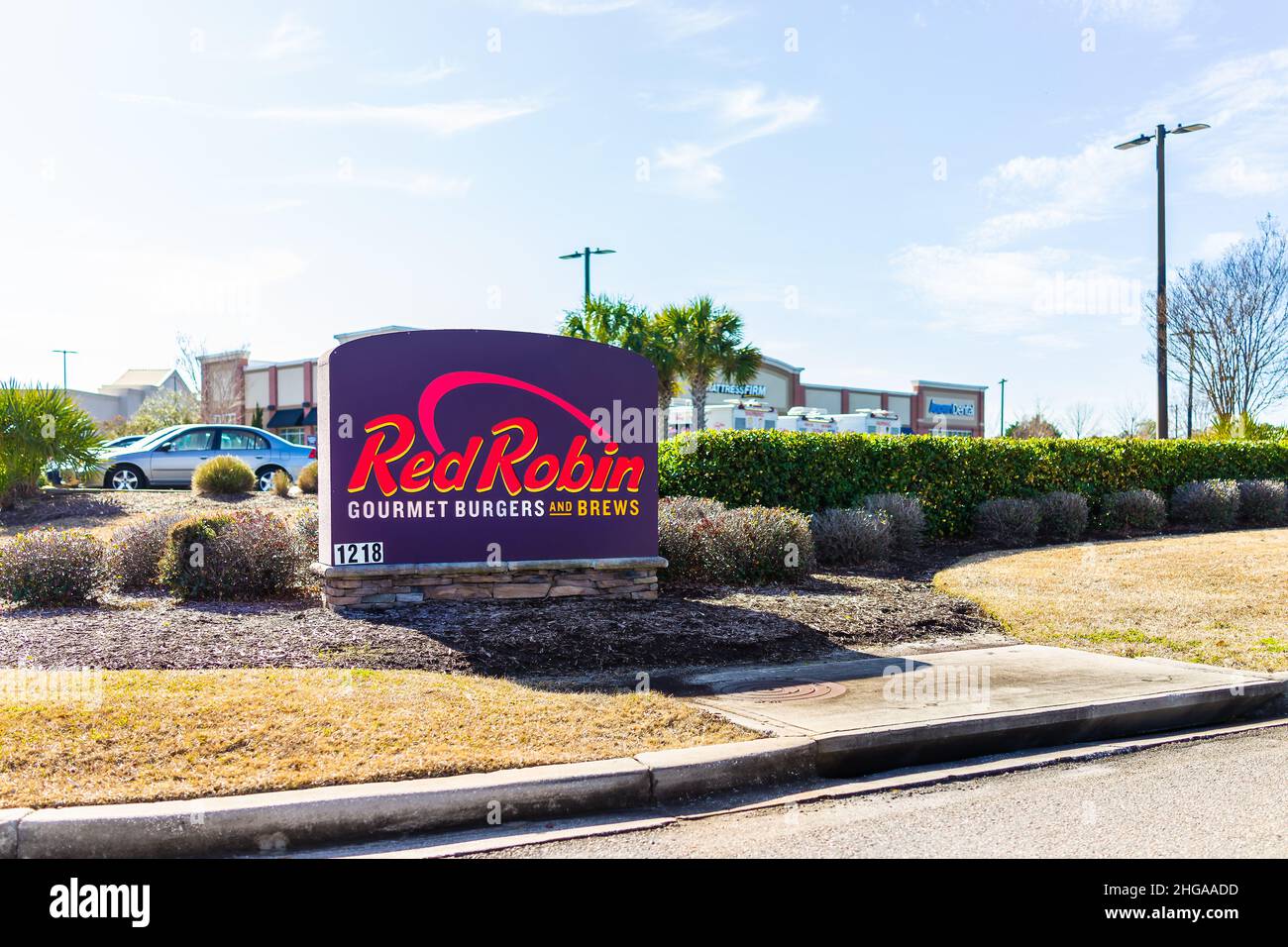 Myrtle Beach, USA - February 8, 2021: Exterior facade of sign building architecture for Red Robin chain restaurant in South Carolina for gourmet burge Stock Photo