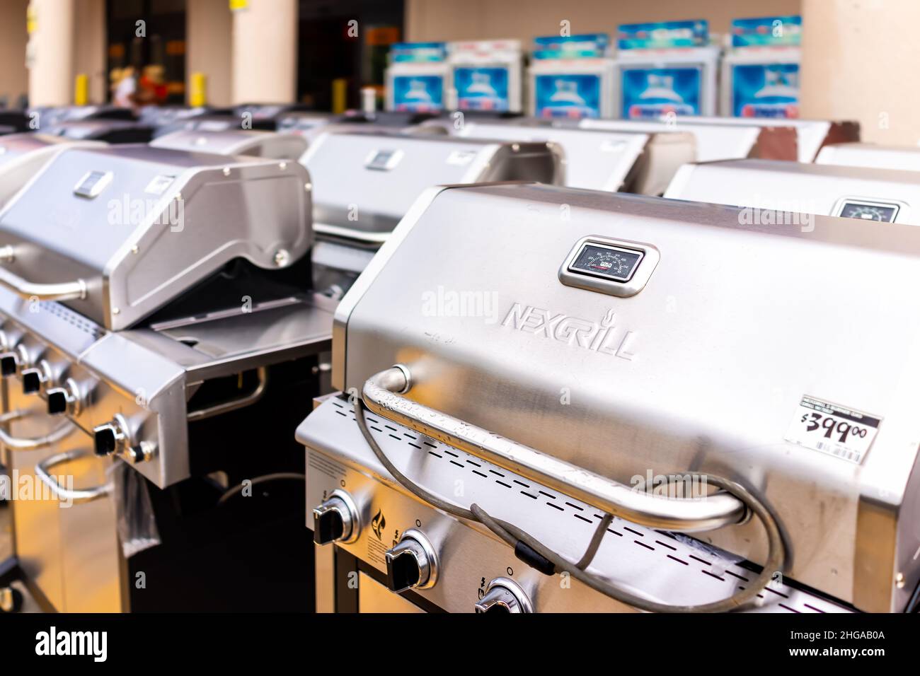 Naples, USA - August 14, 2021: The Home Depot store storefront outside display on street with many electric or gas grills by Nexgrill brand price cost Stock Photo