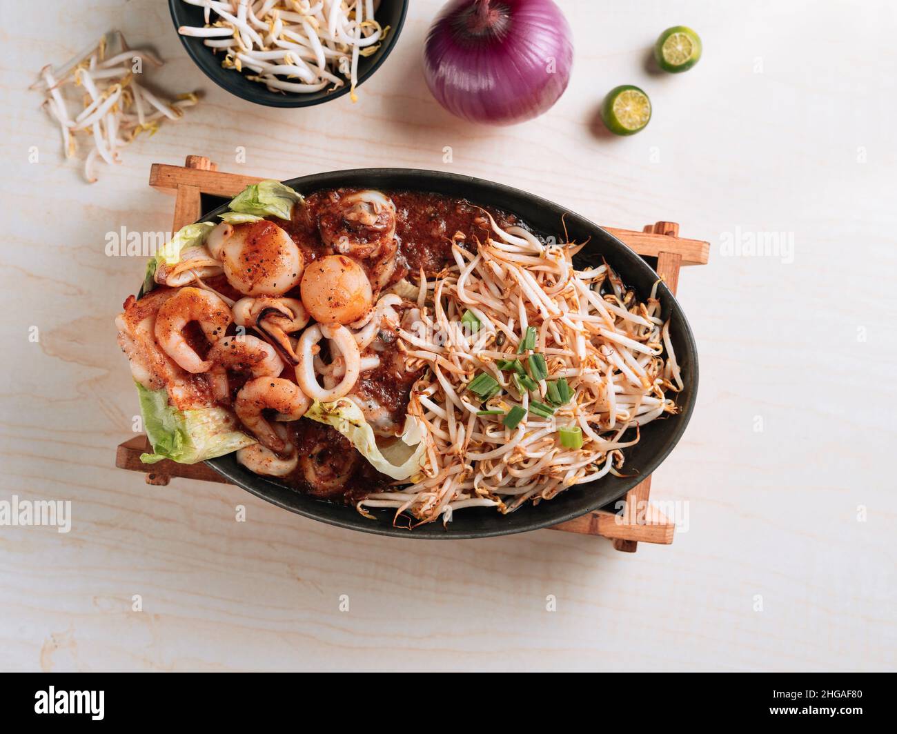 BBQ Squid set with lime top view on grey background Stock Photo Alamy