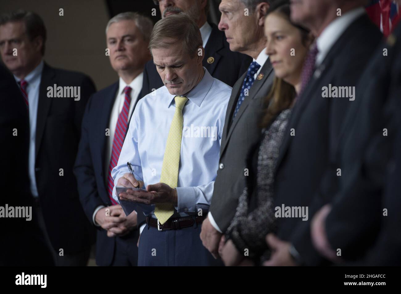 Washington, United States. 19th Jan, 2022. Rep. Jim Jordan, R-OH, takes notes as House Minority Whip Steve Scalise, R-LA, speaks during a press conference after a House Republican Caucus meeting at the US Capitol in Washington, DC on Wednesday, January 19, 2022. Photo by Bonnie Cash/UPI Credit: UPI/Alamy Live News Stock Photo