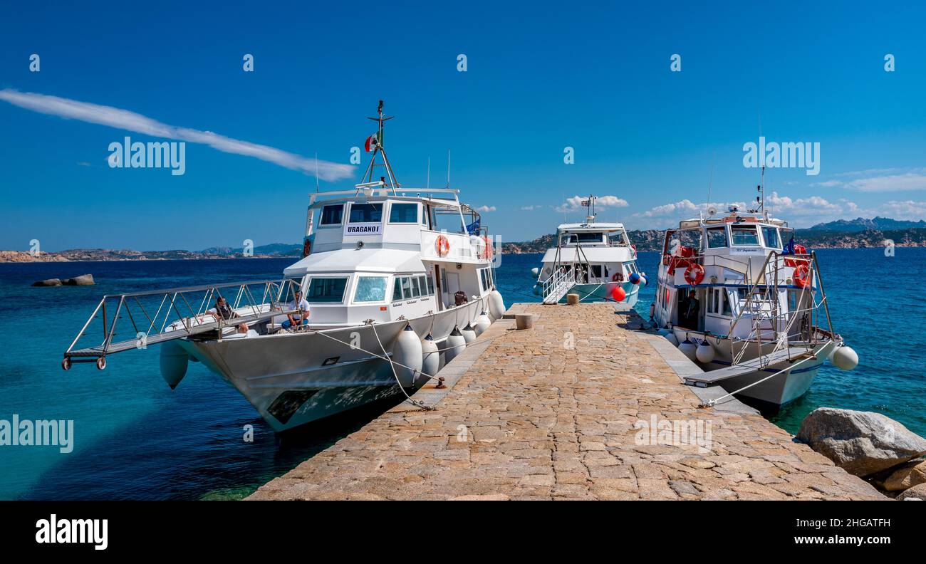 Excursion boats for tourists at the pier on the island of Spargi ...