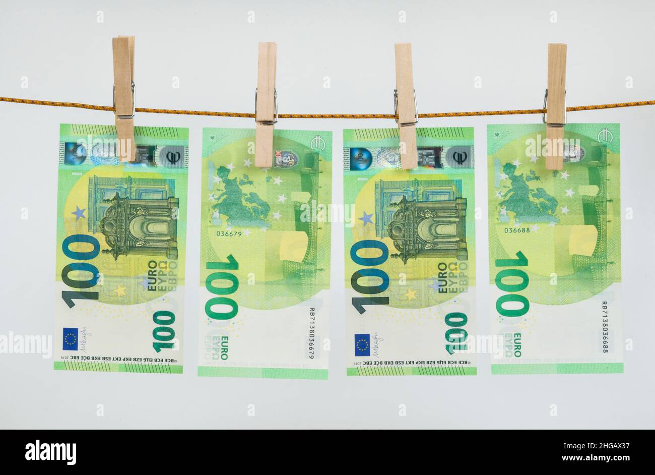 Euro notes, clothesline, symbol photo money laundering, studio shot