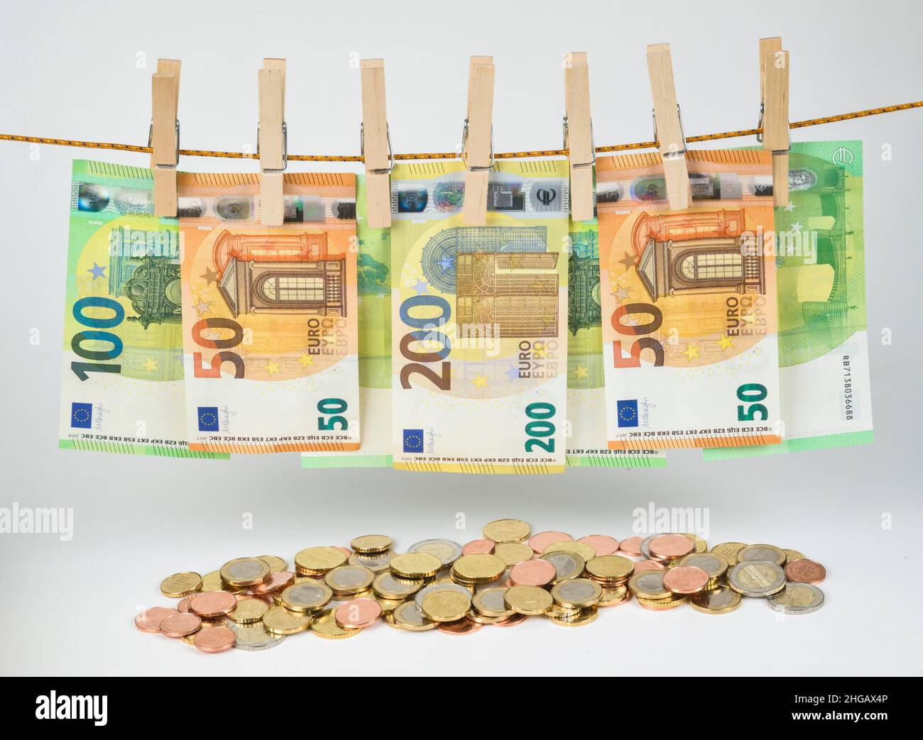 Euro notes, clothesline, symbol photo money laundering, studio shot